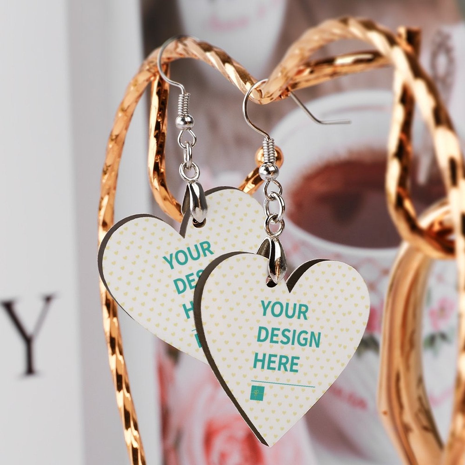 Custom heart drop earrings with personalized design, wood and metal detail, "YOUR DESIGN HERE" message.
