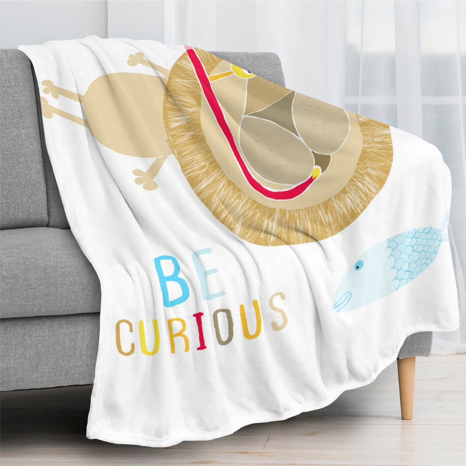 Cute lion baby flannel blanket with "BE CURIOUS" text for kids.
