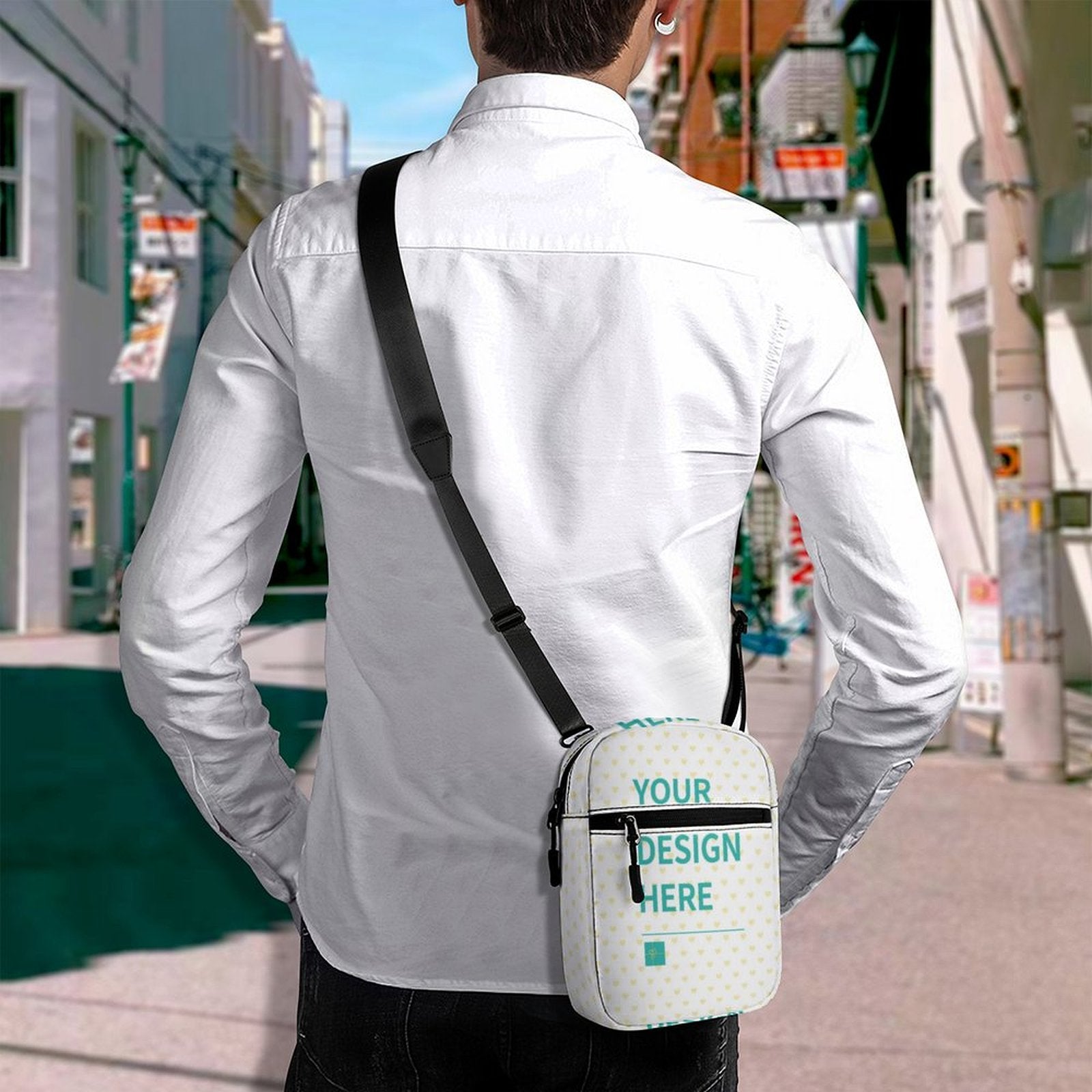 Customizable white oxford cloth crossbody bag with 'YOUR DESIGN HERE' design on a person, perfect personalized gift