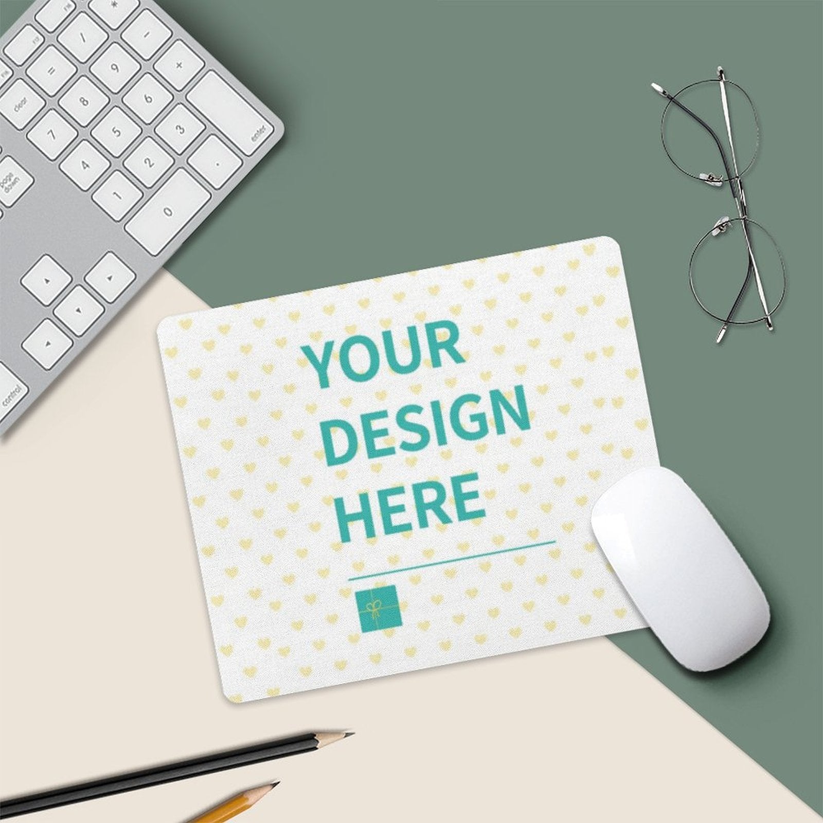 Customizable mouse pad with 'YOUR DESIGN HERE' text, perfect for offices and gaming. White mouse and heart pattern.