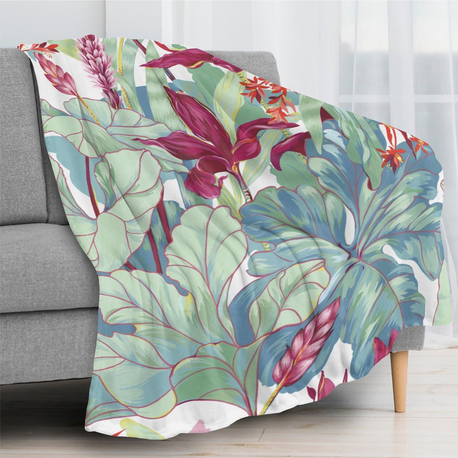 Tropical plants and flower flannel blanket in USA for sofa or bed. Colorful botanical design.