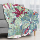 Tropical plants and flower flannel blanket in USA for sofa or bed. Colorful botanical design.