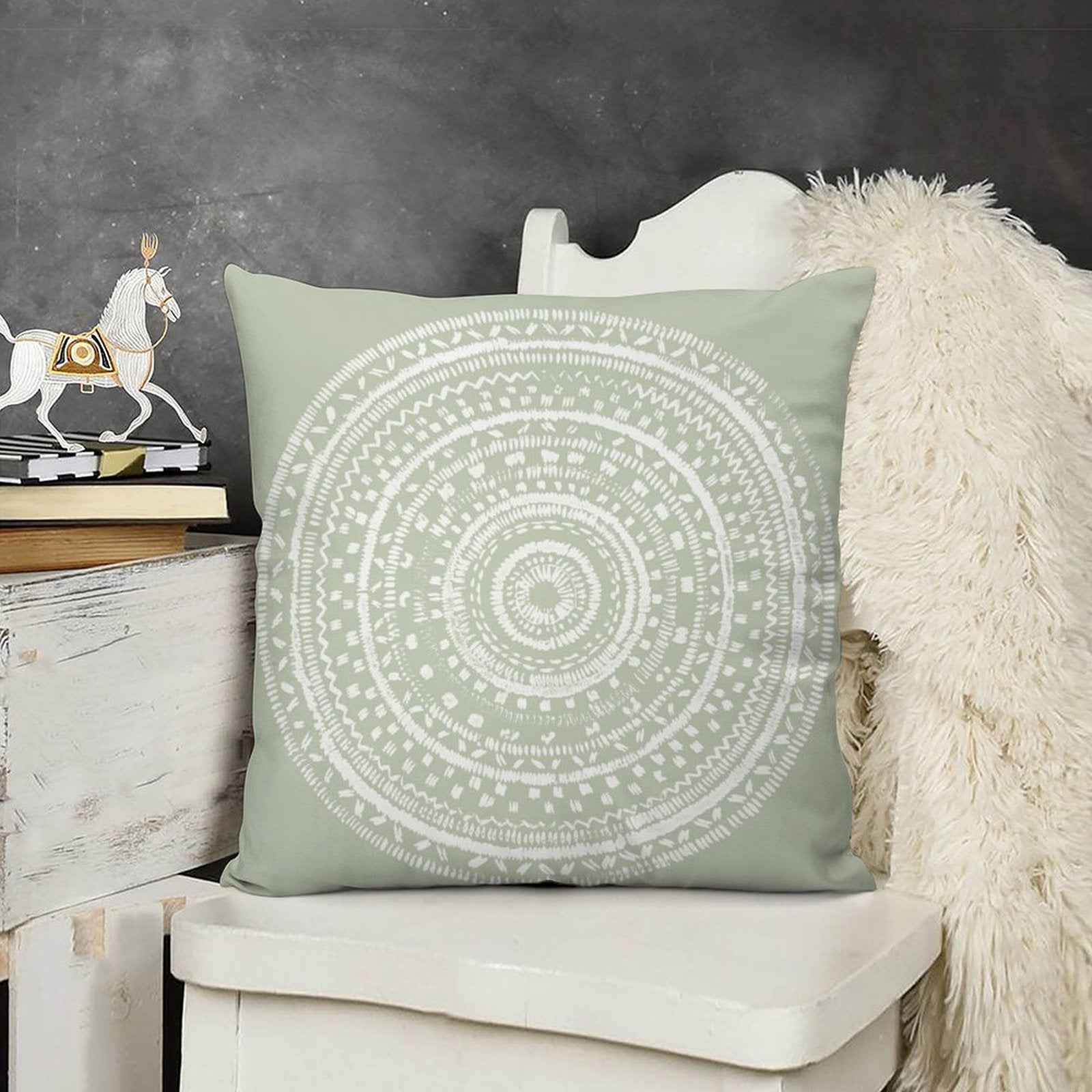 Sage green plush pillow cover with white mandala design, decorative and comfortable.