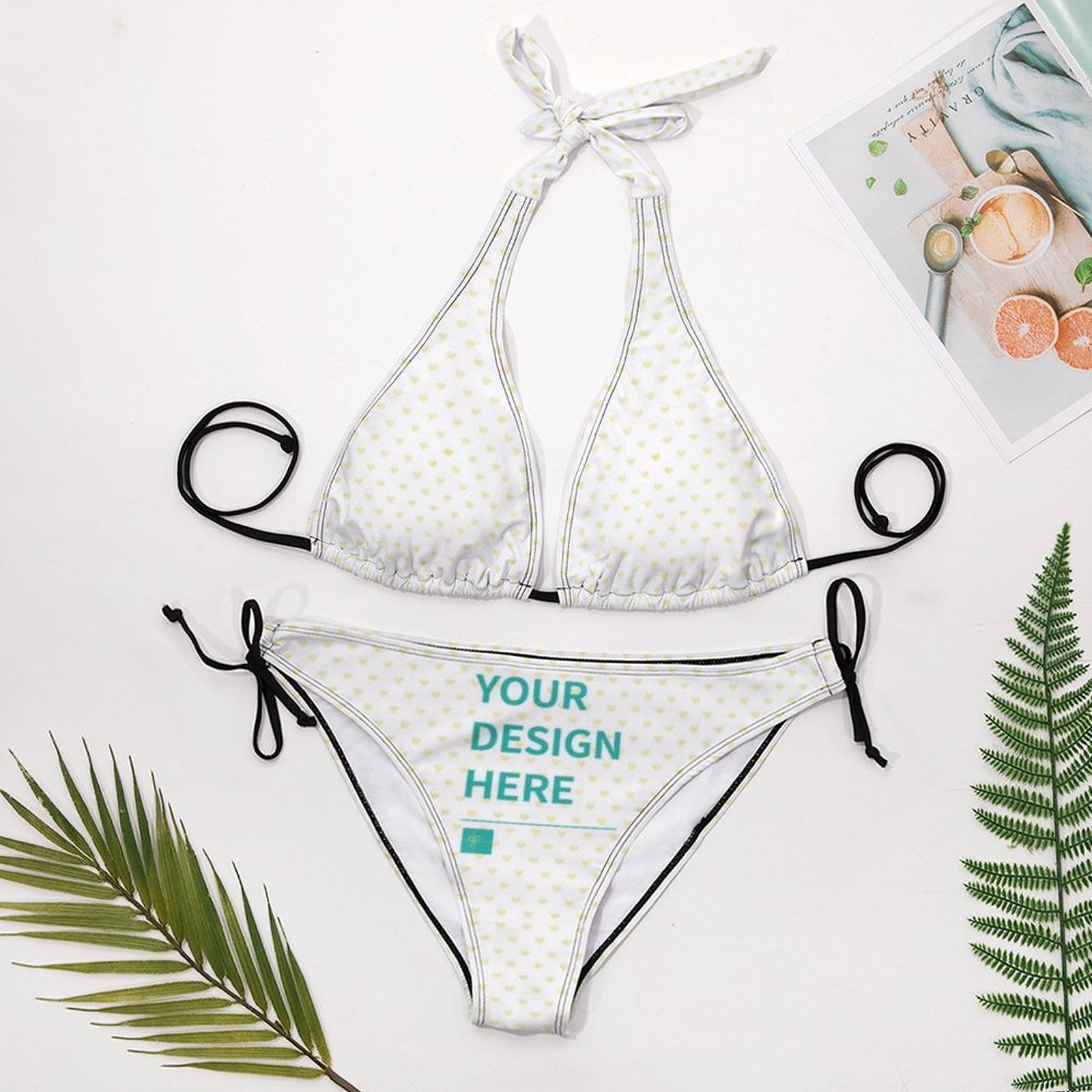 Customizable white bikini with heart pattern and 'YOUR DESIGN HERE' design for women