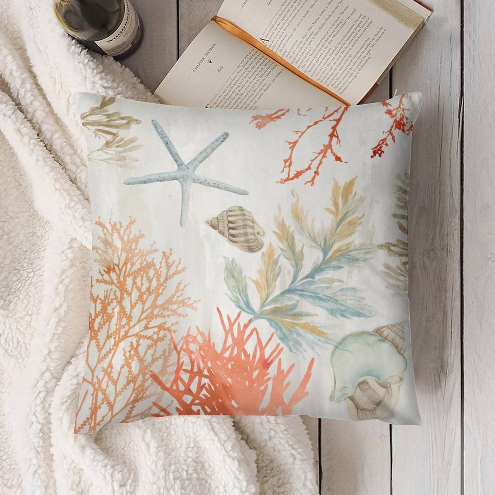 Sea life plush pillow cover for sofa decor. Featuring starfish, coral and seashells. Soft, fluffy, coastal theme.