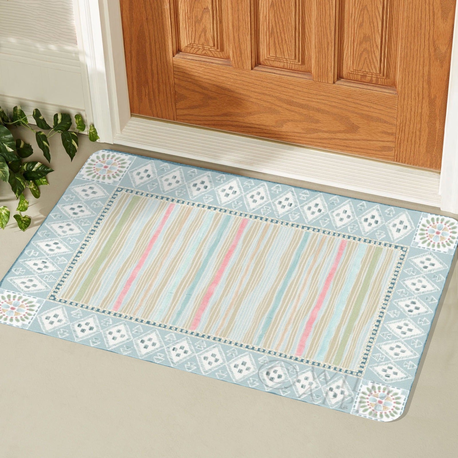 Indoor/Outdoor door mat with geometric design and stripes, suitable for home decor