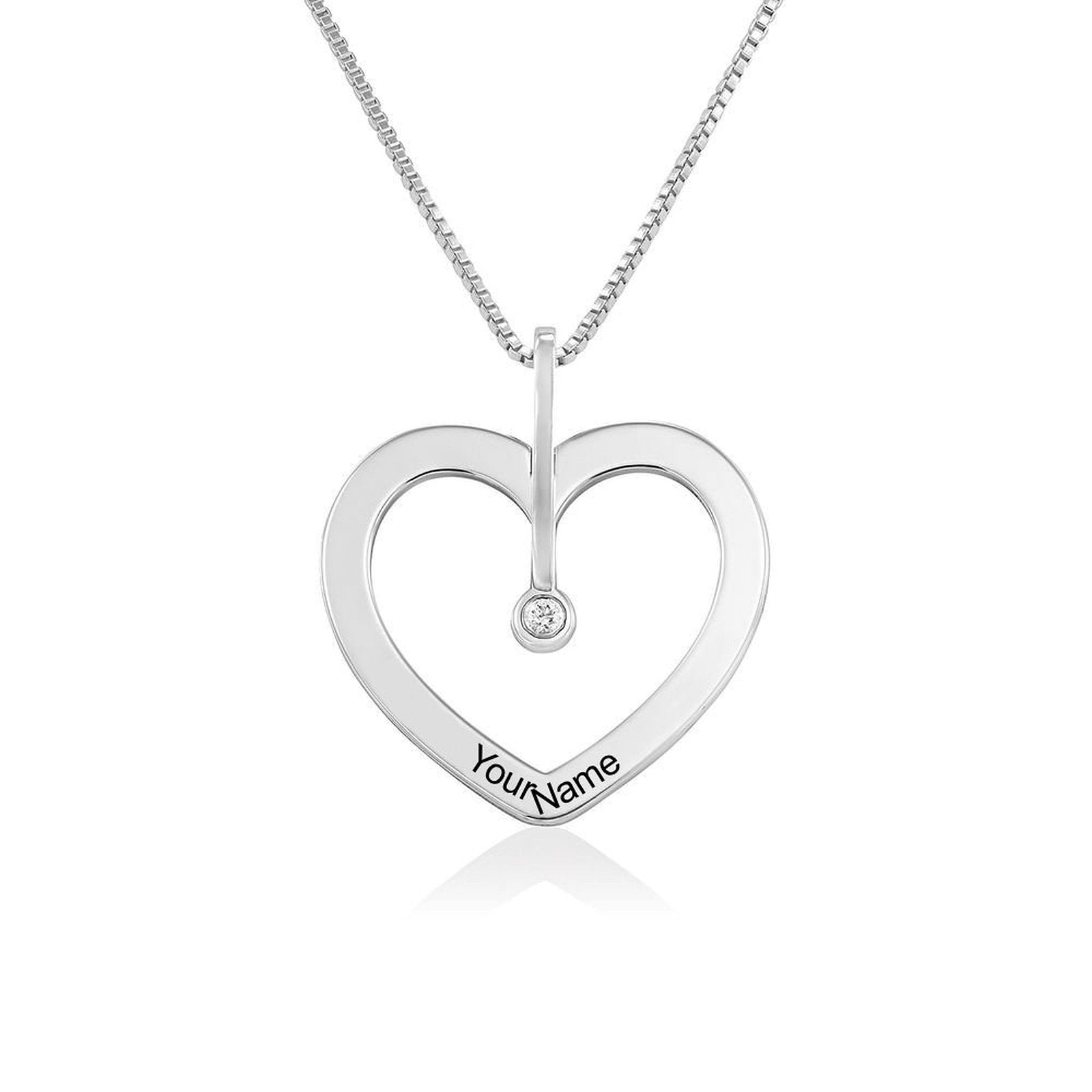 Personalized silver heart necklace with custom name engraving. Jewelry gift for women, crafted with silver.