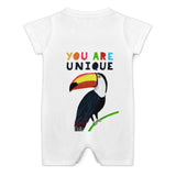 Soft cotton baby bodysuit with toucan and "YOU ARE UNIQUE" text, newborn romper