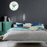 Customizable wooden wall clock with 'YOUR DESIGN HERE' text, ideal for home decor or a housewarming gift