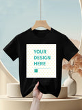 Customizable black cotton kids t-shirt with 'YOUR DESIGN HERE' design area for personalized gifts, made in USA