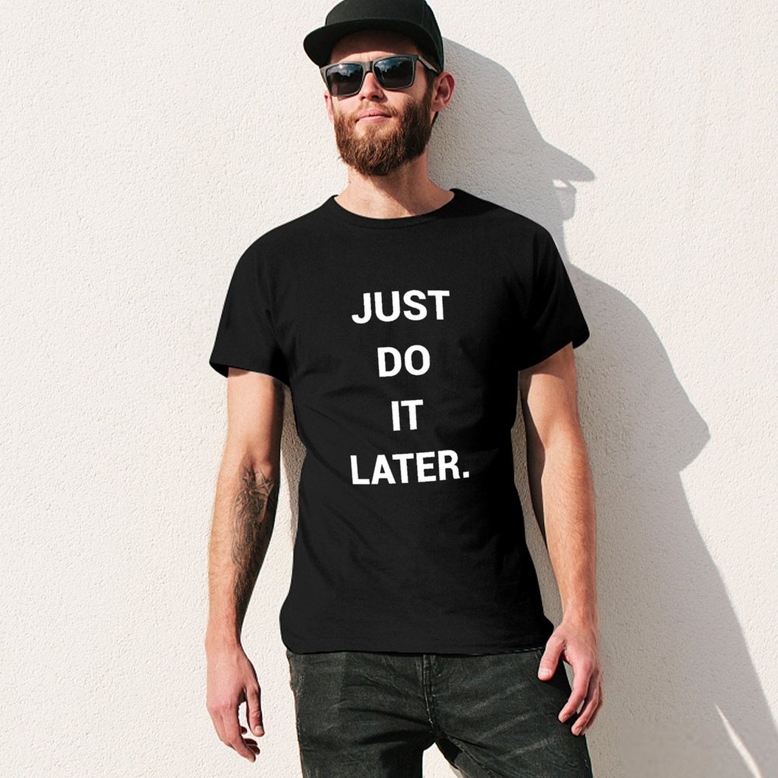 Black men's t-shirt with 'Just Do It Later' quote, short sleeve crew neck tee