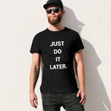 Black men's t-shirt with 'Just Do It Later' quote, short sleeve crew neck tee