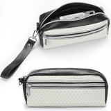 Black and white lychee leather cosmetic bag, double zipper, yellow polka dots, with strap; ideal as a makeup or pencil case.