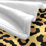 White flannel blanket, leopard print pattern, soft and warm, perfect for indoor or outdoor use, made in USA