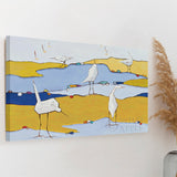 Canvas print with white birds on a yellow and blue landscape, Wild Apple wall art for home decor, made in USA.