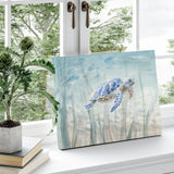 Undersea Turtle Canvas Print by DANHUI NAI, wall art for home decor. Features a blue sea turtle swimming.