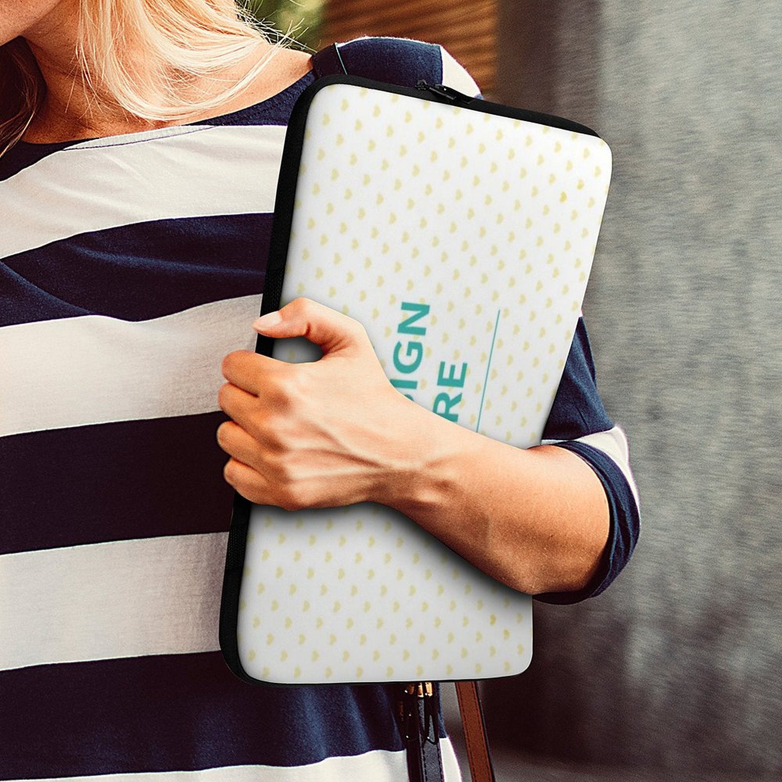 Custom laptop sleeve with heart pattern, featuring 'DESIGN RE' text, neoprene material, and black zipper.