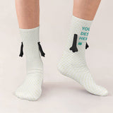 White magnetic couple socks with holding hands design and 'Your Design Here' text.
