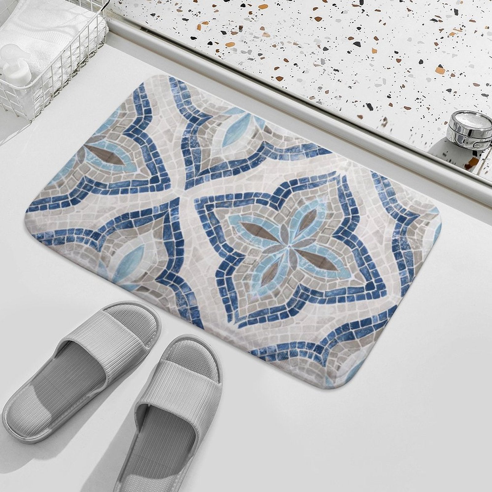 Coral velvet bath rug with mosaic pattern in bathroom; non-slip, quick-drying bath mat with blue, gray design