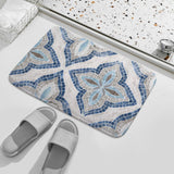 Coral velvet bath rug with mosaic pattern in bathroom; non-slip, quick-drying bath mat with blue, gray design