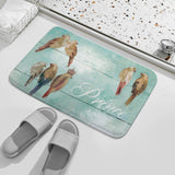 Coral velvet bath rug with watercolor bird design and Prince text for bathroom