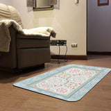Blue floral desert entrance door mat on wooden floor, indoor or outdoor use