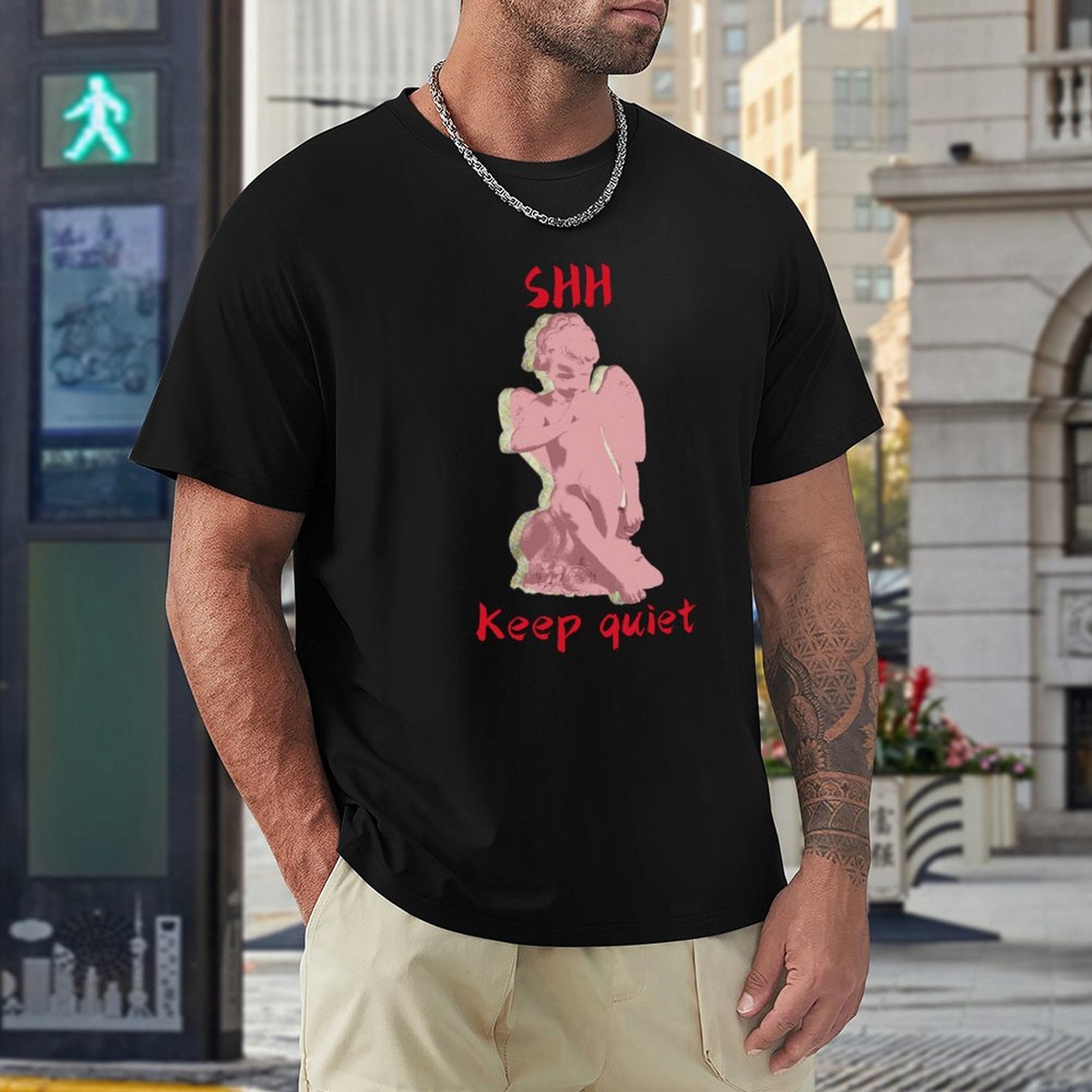 Black men's crew neck t-shirt with pink angel graphic and "SHH Keep Quiet" text print, perfect tee for MyArtsyGift.