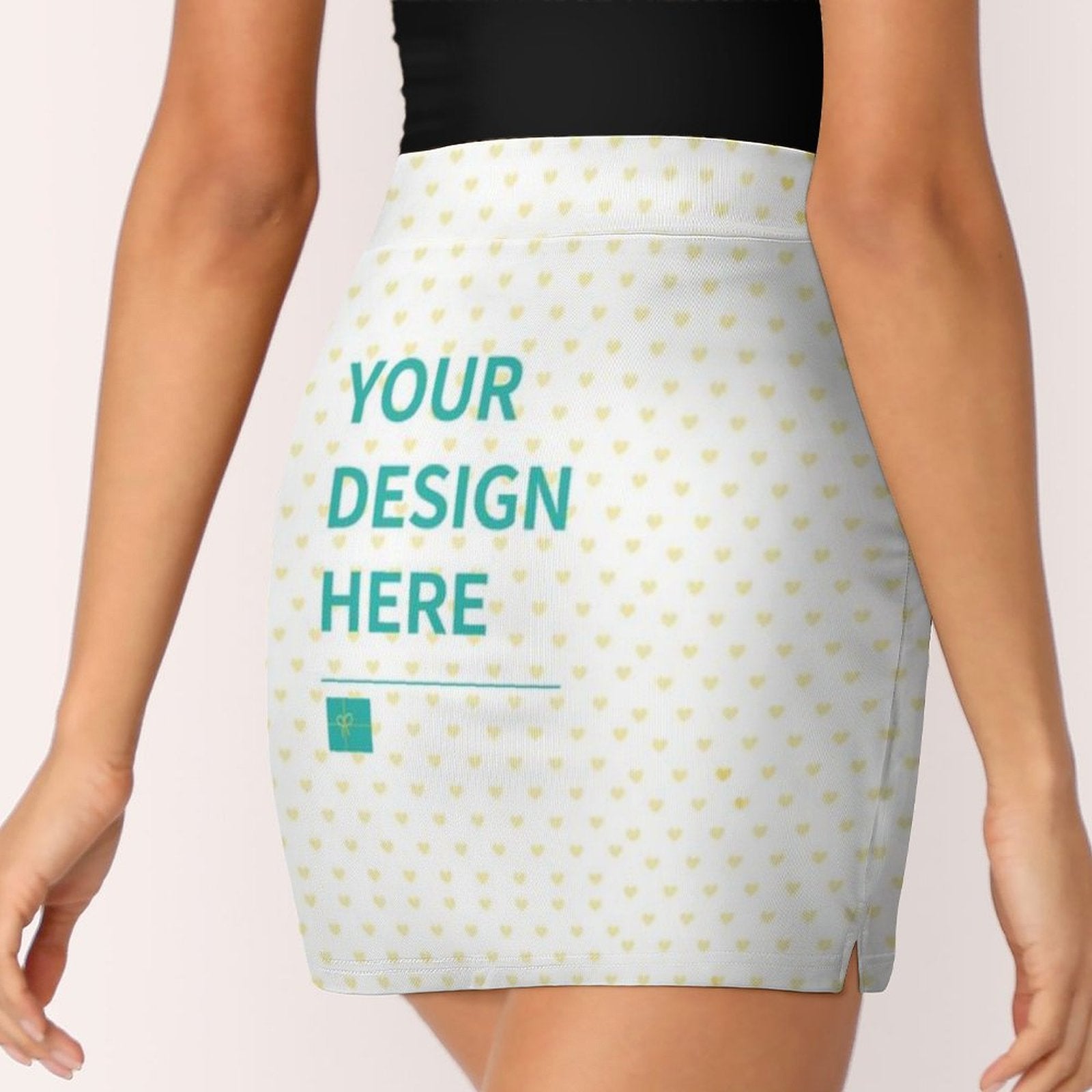 Customizable women's tennis golf skort. White fabric with heart print, featuring 'YOUR DESIGN HERE' text.