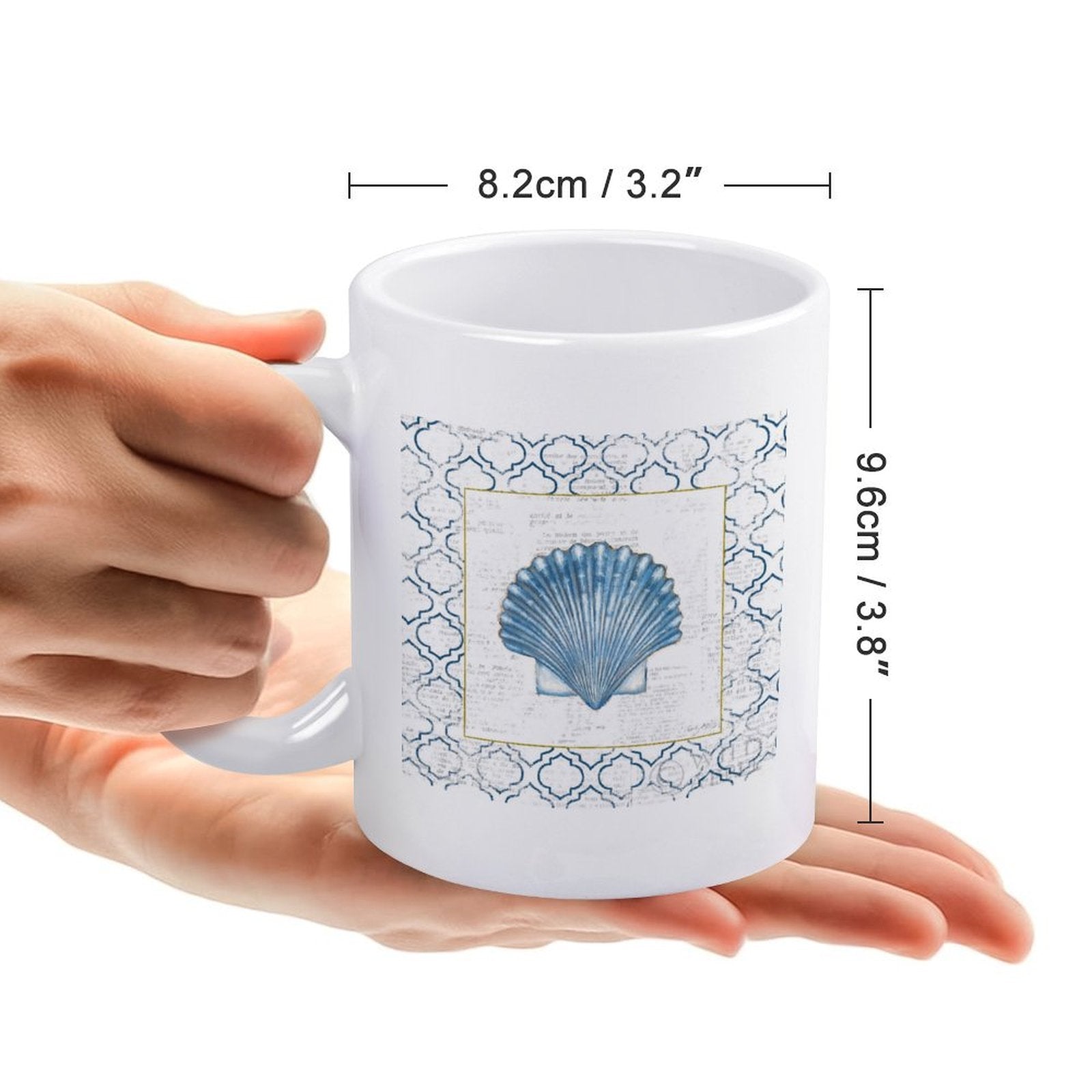 Personalized white ceramic coffee mug with seashell design for gift.