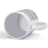 Personalized white ceramic mug with Be Happy watercolor design, perfect gift.