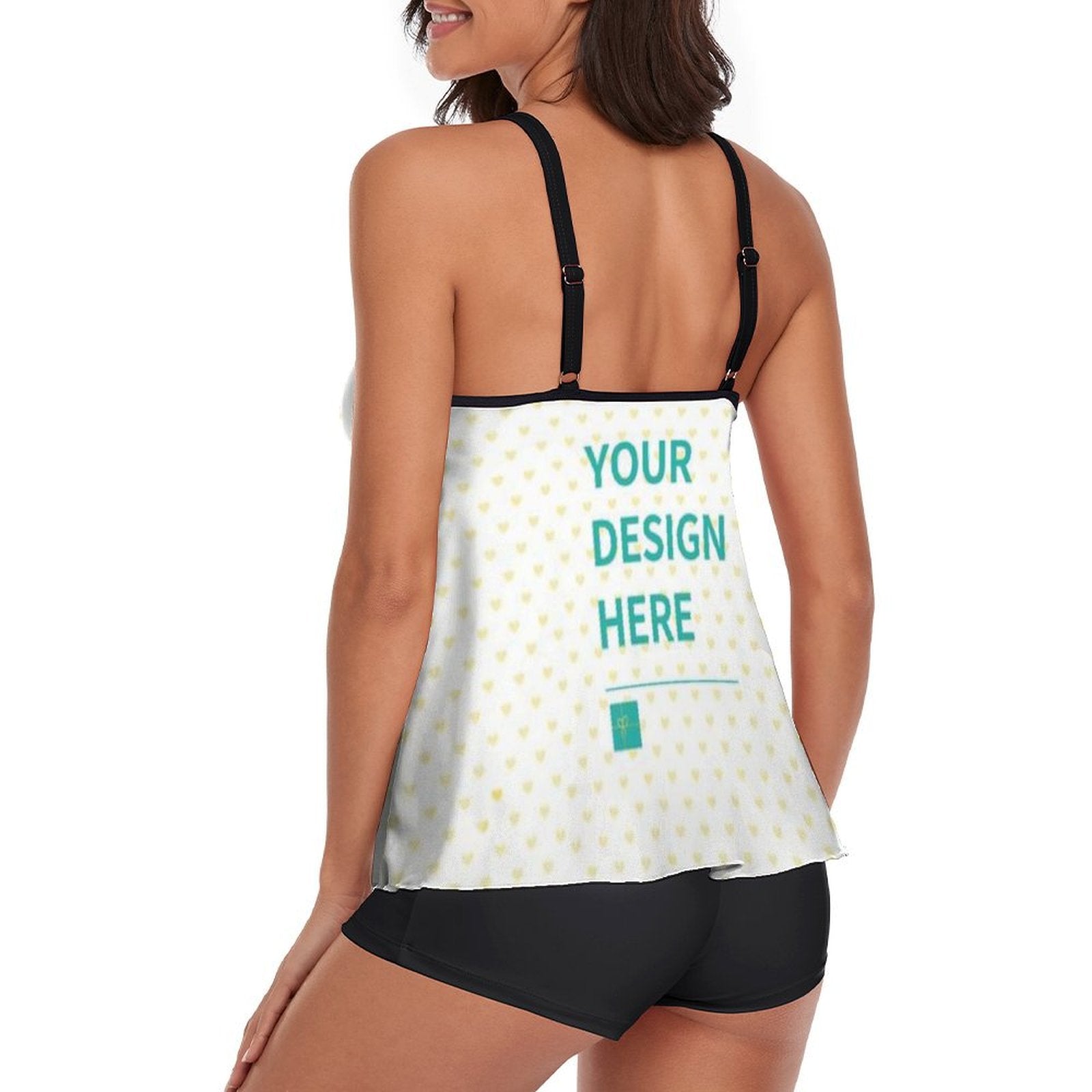 Customizable tankini swimsuit for women with 'YOUR DESIGN HERE' text, heart pattern top, black shorts, and adjustable straps