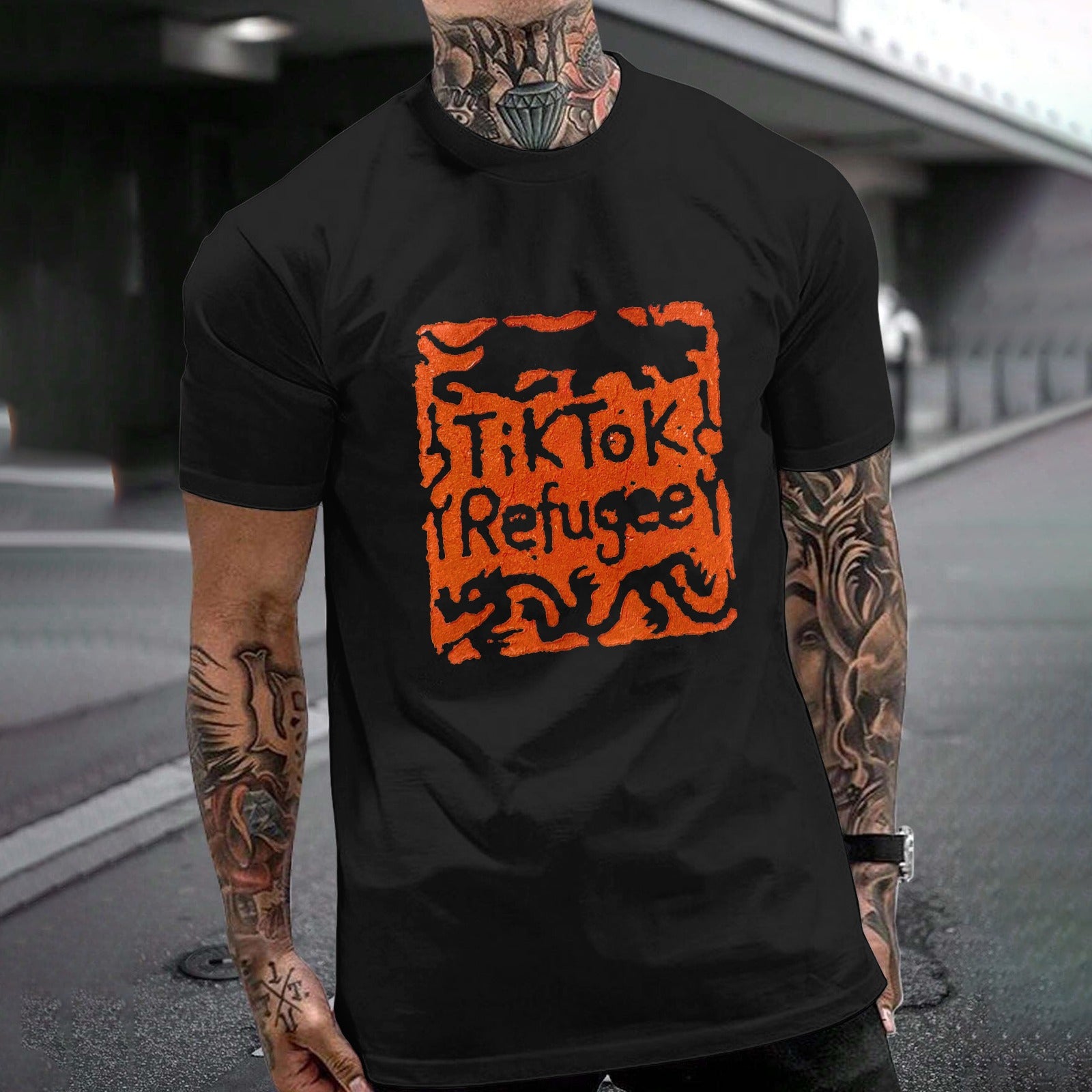 Black TikTok Refugee Gildan tee. Cotton t-shirt with unique orange stamp design, perfect for everyday wear.