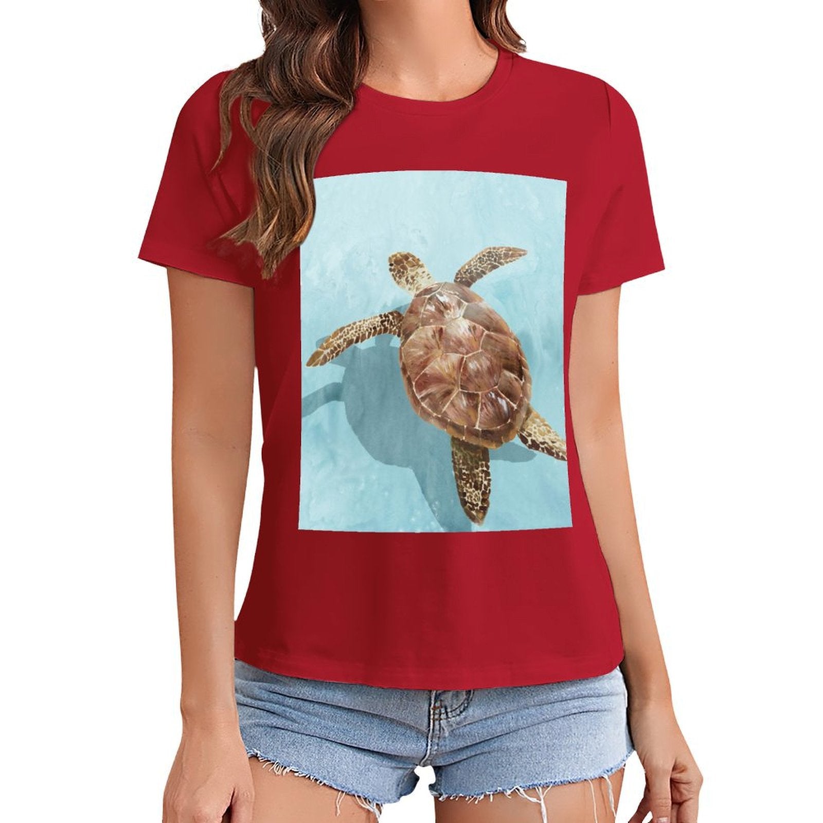 Women's red crewneck t-shirt with sea turtle graphic print, casual summer wear.