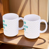 White ceramic mug with yellow heart pattern and "YOUR DESIGN HERE" text, perfect for personalized gifts, made in USA.