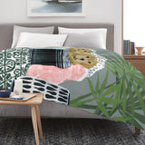 Laundry Dogs Flannel Blanket on bed, USA made with puppy art, soft and cozy. Perfect for couch or bed.