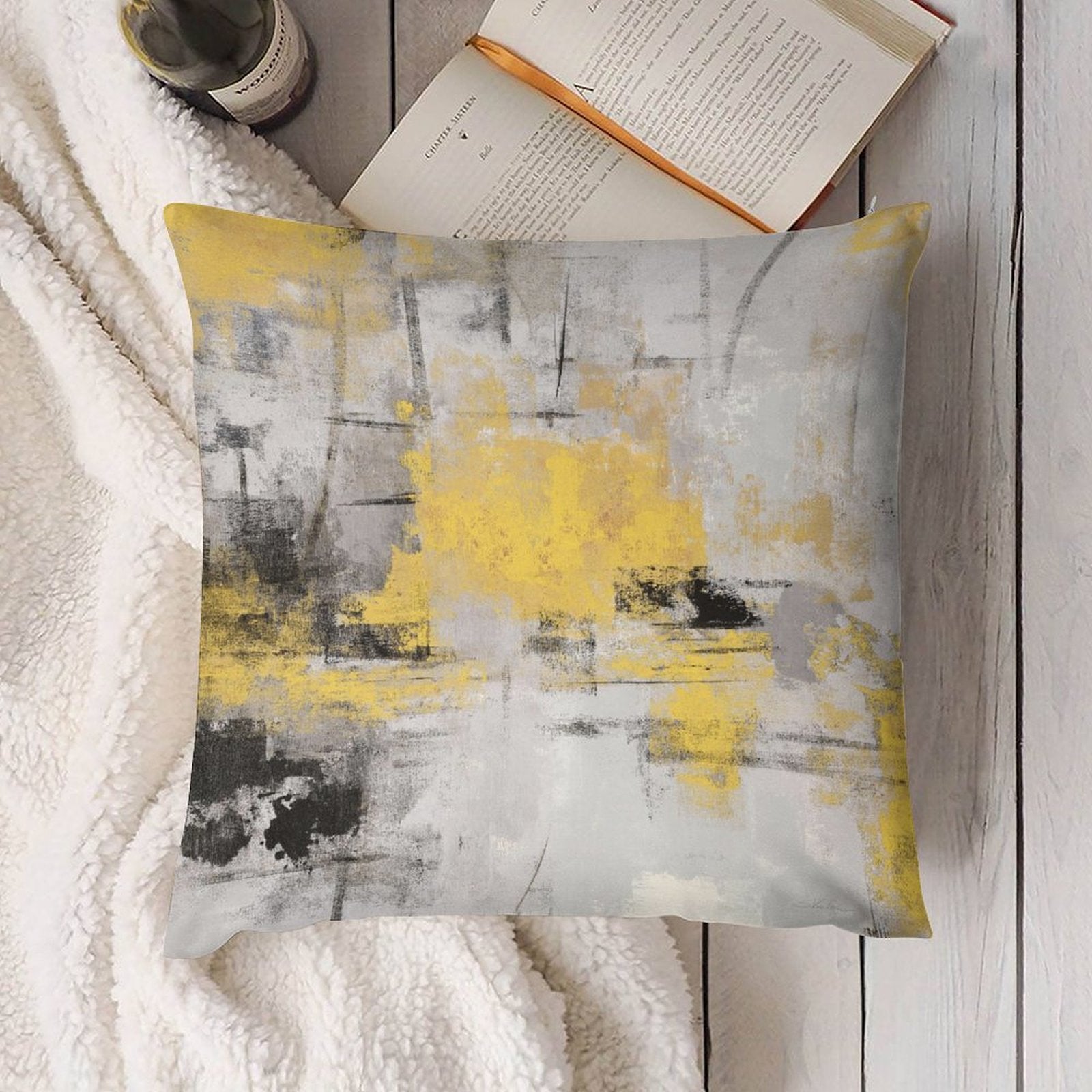 Abstract art plush pillow cover with yellow, gray, and black design for sofa. Soft, fluffy decorative cushion.