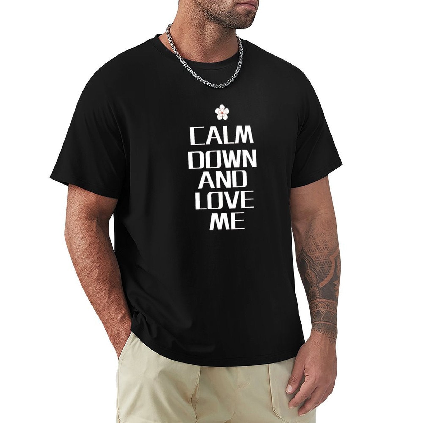 Black men's crew neck t-shirt with "CALM DOWN AND LOVE ME" text, printed design on cotton fabric, available in S-6XL.