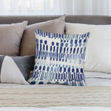 Abstract blue pillow cover for sofa decor. Soft plush material and decorative design for living room.
