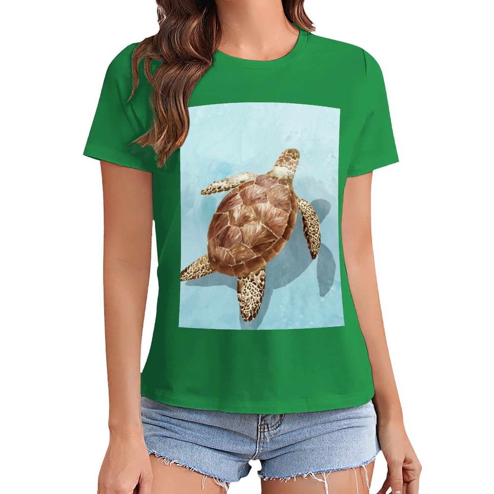 Green women's t-shirt with sea turtle graphic print. MyArtsyGift crewneck tee, summer fashion.