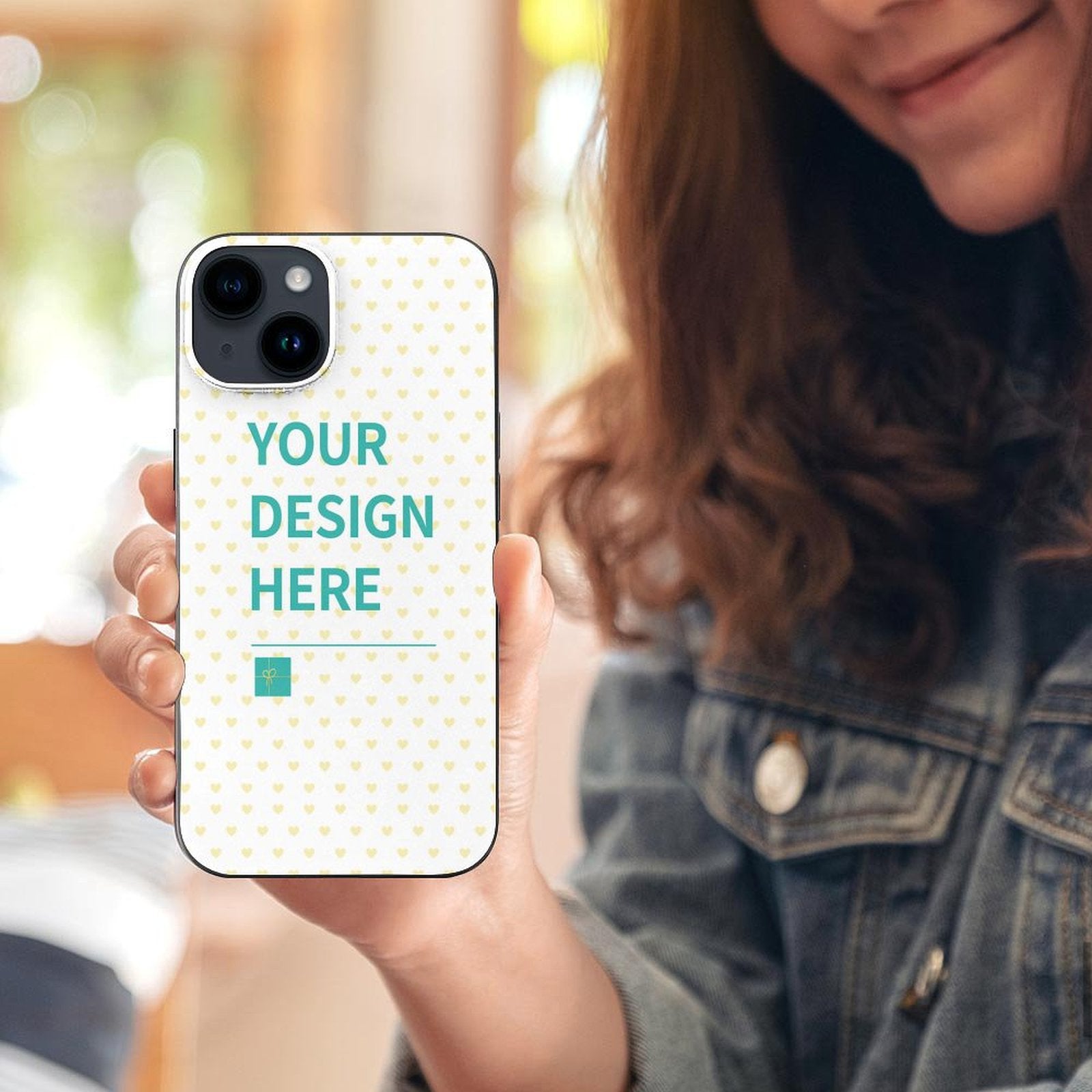 Custom iPhone 14 case with 'YOUR DESIGN HERE' and heart pattern, TPU material