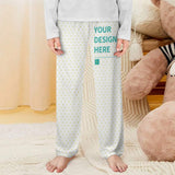 Personalized pajama pants for toddler with heart pattern and "YOUR DESIGN HERE" design text.