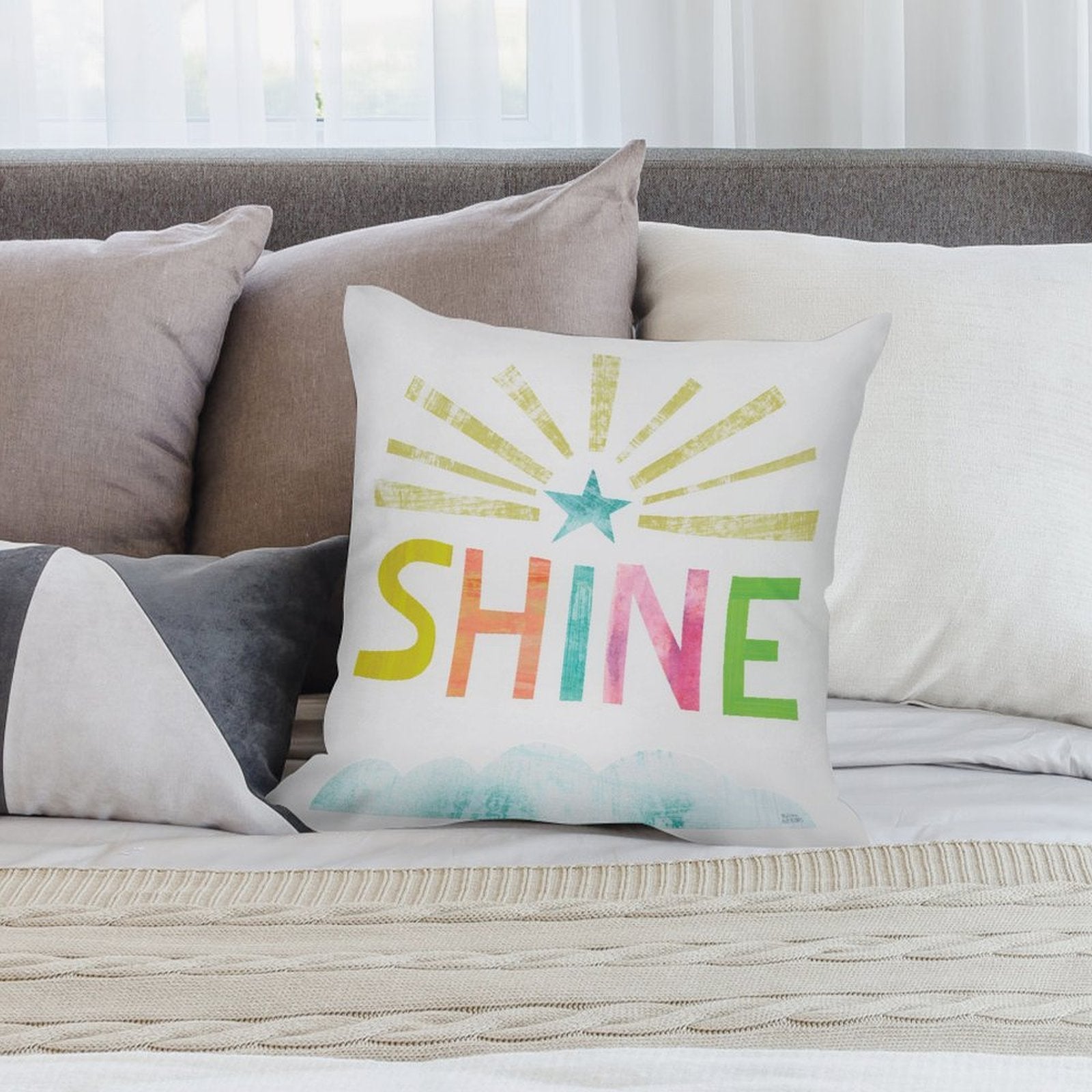 Soft, fluffy plush pillow cover with colorful "SHINE" design, perfect for adding charm to a sofa or living room.