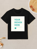 Customizable black cotton kids t-shirt with "YOUR DESIGN HERE" text for personalized design.