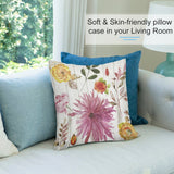 Soft plush pillow cover with watercolor floral design in living room decor.