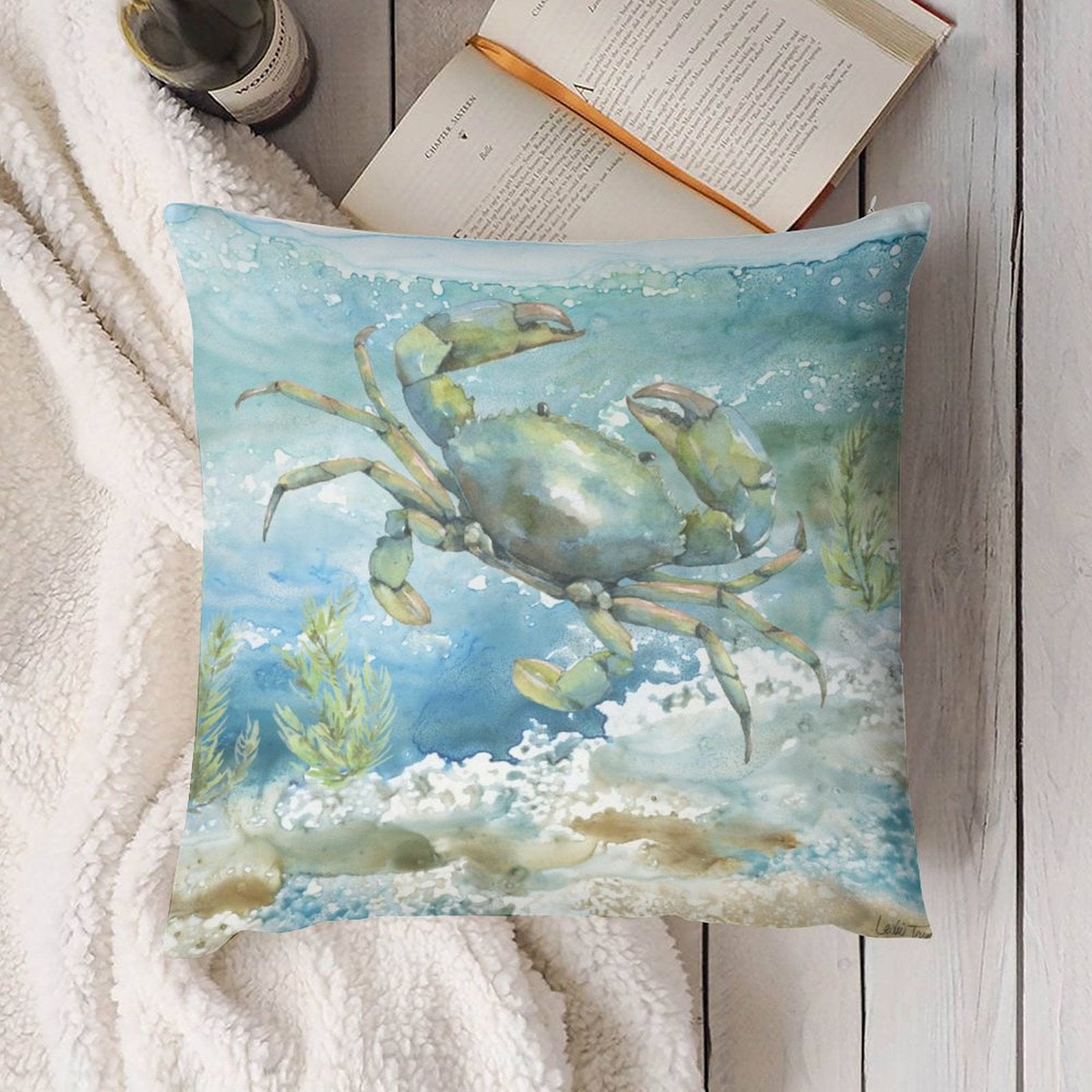 Watercolor crab pillow cover on soft plush fabric. Coastal decor with aquatic art for sofa or bed.
