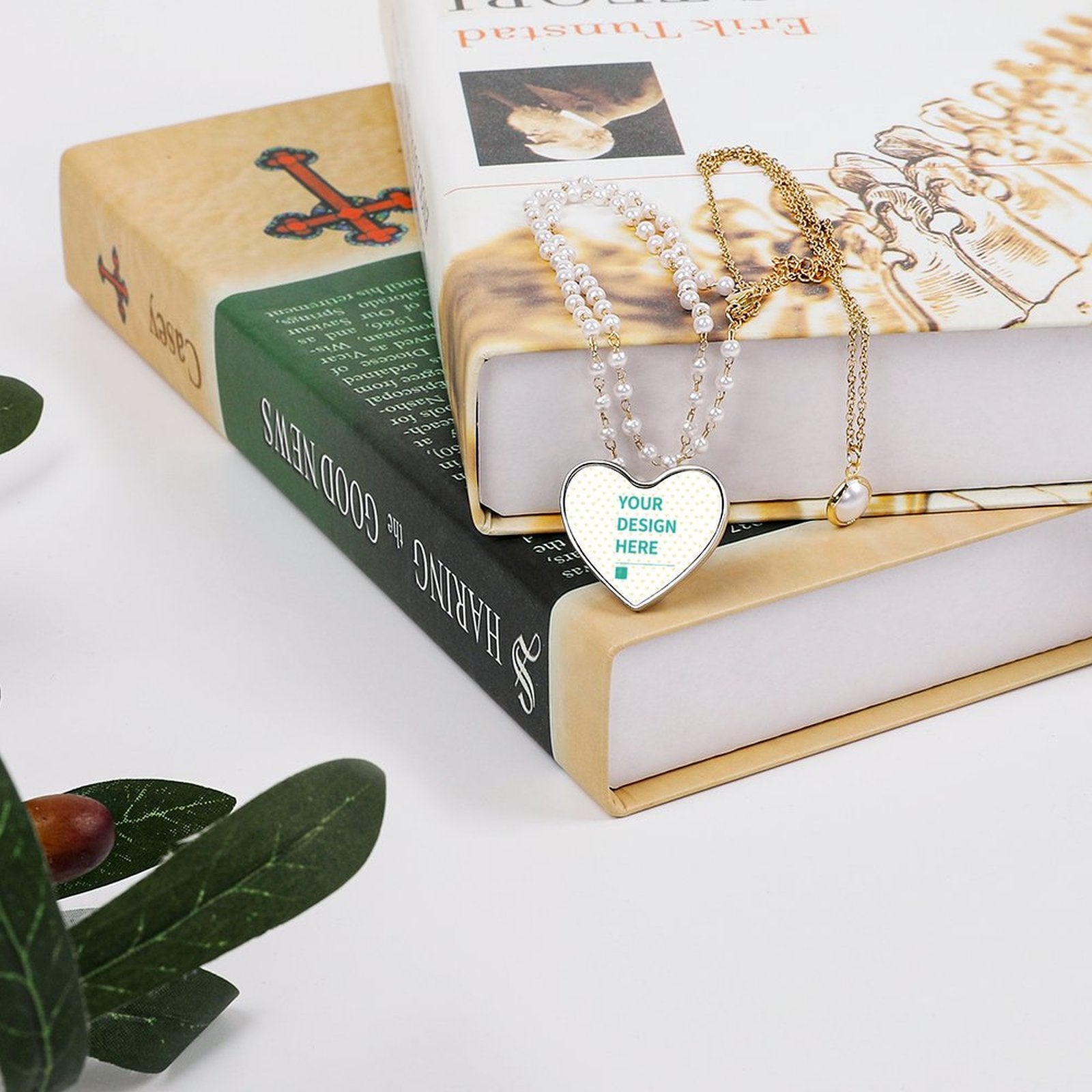 Heart-shaped pendant with custom design, pearl and gold chain, perfect personalized gift for her.