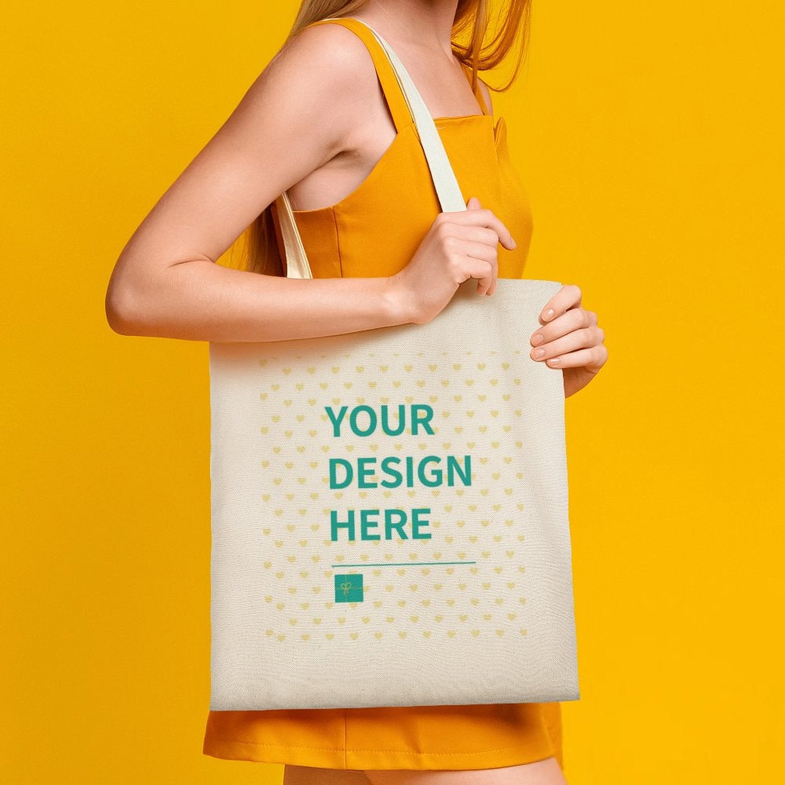 Customizable canvas tote bag with "YOUR DESIGN HERE" design, perfect for shopping at MyArtsyGift