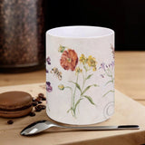 White ceramic mug with wildflower design. Perfect for home or office. Customizable gift from MyArtsyGift.