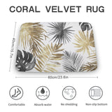 Coral velvet bathroom rug with gold and gray tropical leaf pattern, non-slip and absorbent, 40x60cm