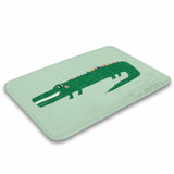 Green alligator bath rug, non-slip bathroom decor by Wild Apple. Coral velvet rug for bathroom.
